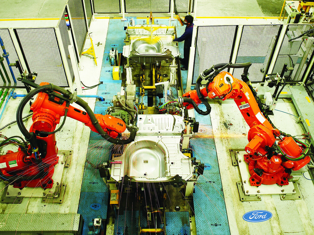 Manipulator Arms on an assembly line